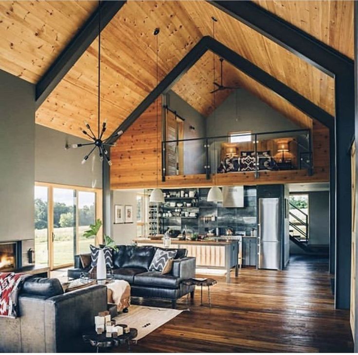 Loft, vaulted ceilings, and wide open Modern barn house